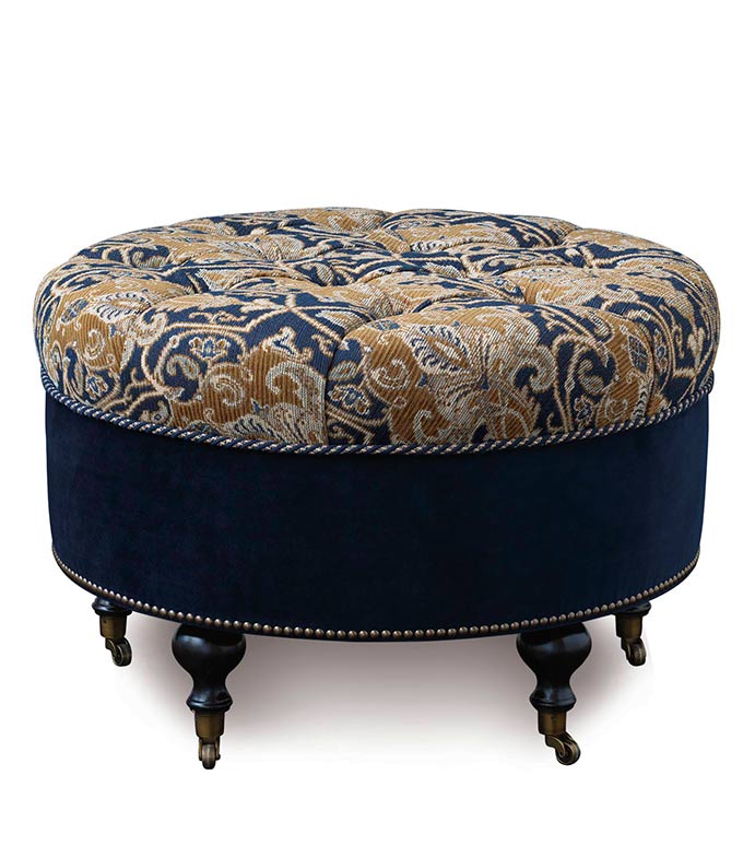 Arthur Ochre Round Ottoman - PAISLEY TUFTED OTTOMAN,ROUND TUFTED OTTOMAN,DEEP TUFTED,NAVY AND GOLD,TRADITIONAL TUFTED OTTOMAN,CLASSIC,MASCULINE,BLUE VELVET,CASTER WHEELS,TUFTED UPHOLSTERY,GOLD PAISLEY,NAVY